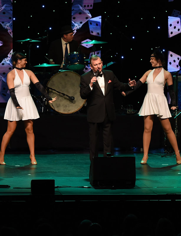 Martin-Joseph-Performs-Sinatra-on-stage-at-Floral-Pavillion-Theatre-with-Vegas-Showgirls